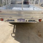 12 x 7 Tipping Flat top trailer with sides and cage 2.8 tonne Loadstar rear