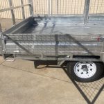 12 x 7 Tipping Flat top trailer with sides and cage 2.8 tonne Loadstar drop side
